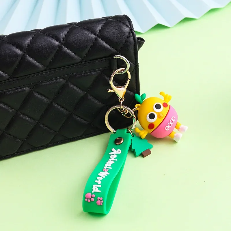 Miniso 高級で絶妙なキーチェーンペンダント、人形、かわいい学生用スクールバッグ、車のキーチェーンペンダント、小さなギフトに最適