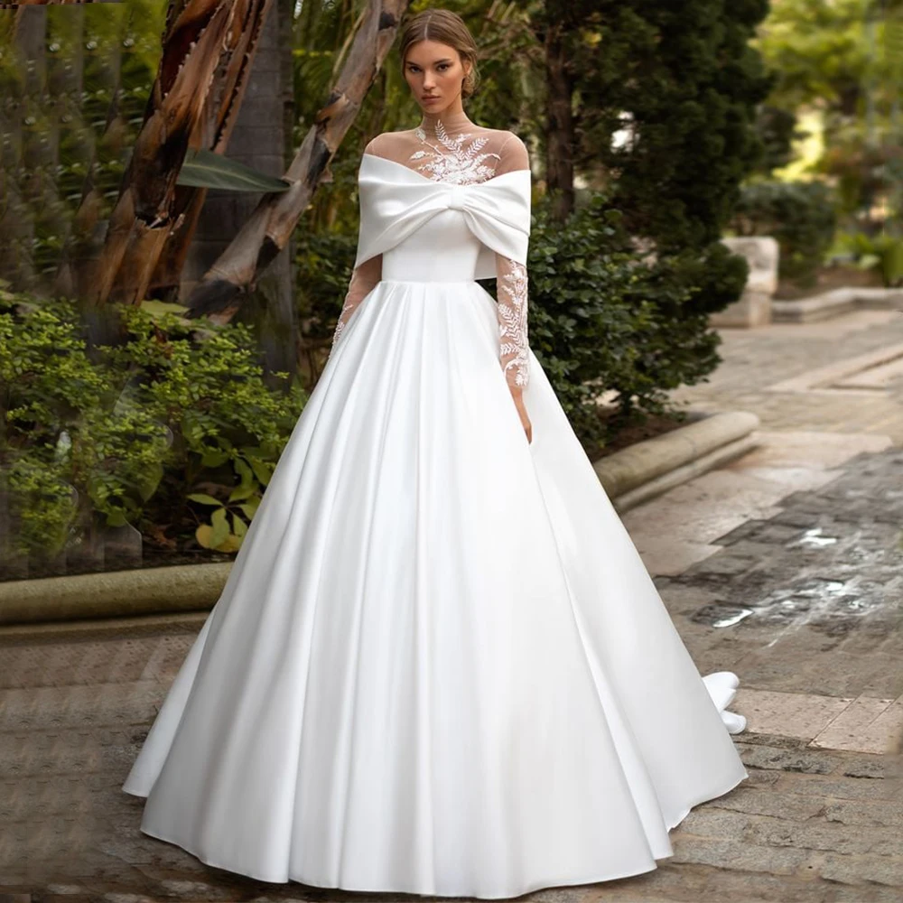 

Exquisite High Neck Applique Wedding Dress with Large Bow Off the Shoulder Long Sleeve A-Line Floor Length Bride Sweep Train