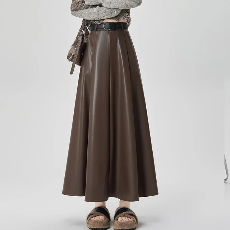 

Seoulish Autumn Winter PU Leather Women's Umbrella Long Skirts with Belted 2025 New Vintage High Waist Loose A-line Skirt Female