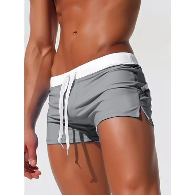 Cross-border new swimming trunks summer men's solid color wide beach swimming trunks