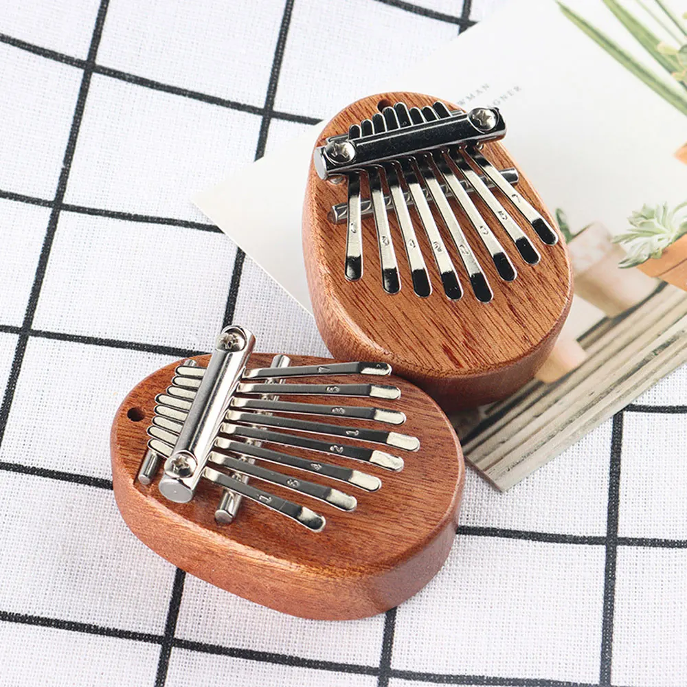 

8 Key Kalimba Music Instrument Mini Musical Keyboard Thumb Piano Wooden Gifts Acrylic Cute Small Wearable Child Gift Sports