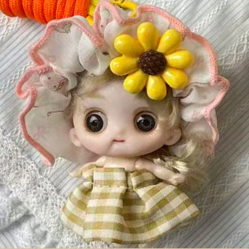 Mignon dessin animé tête tournesol poupée porte-clés pendentif sac à main pendentif voiture porte-clés suspendu.