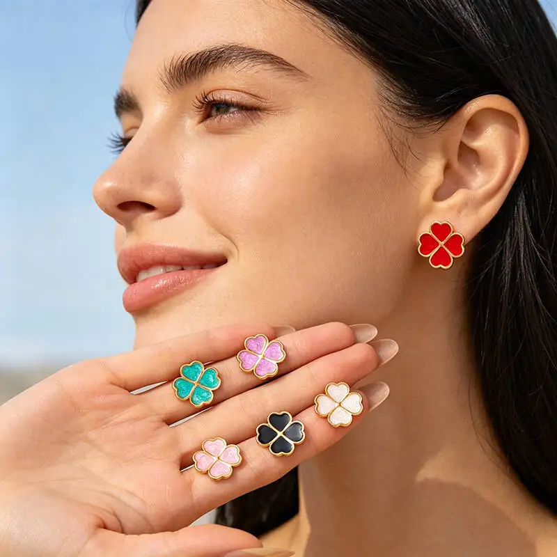 Oil-drop heart-shaped four-leaf clover stainless steel stud earrings - simple elegant, luxurious and exquisite titanium jewelry.