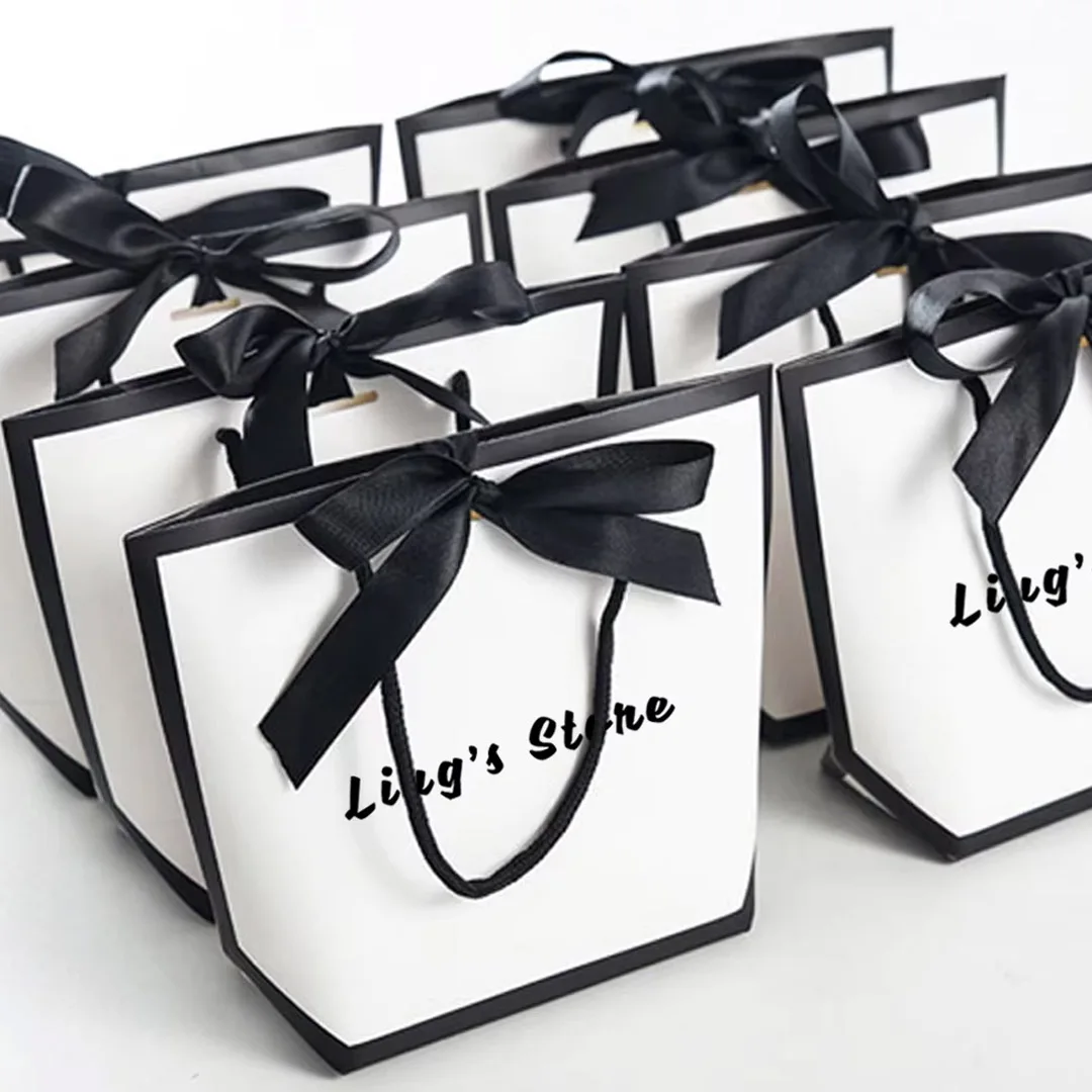 Custom Logo White Paper Bag With Black Ribbon Jewelry Tote Handle Bowknot Bag Wedding Birthday Party Shopping Favors Packaging