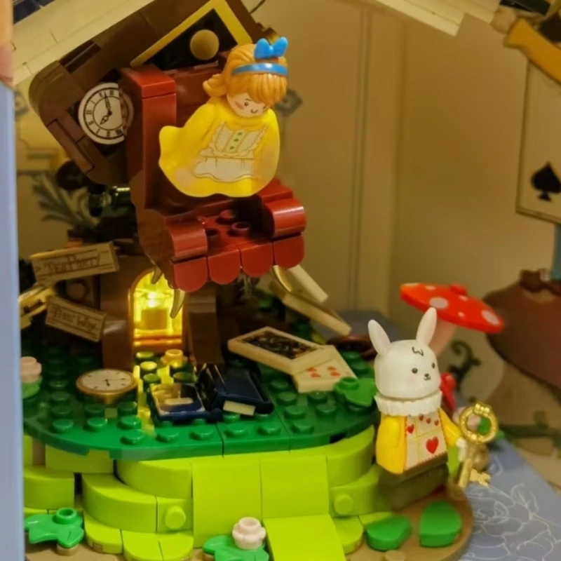 Libro di fiabe Alice senza peso Blocchi di costruzione Modello di giunzione Confezione regalo creativa Ornamenti Giocattoli educativi Regalo di Natale