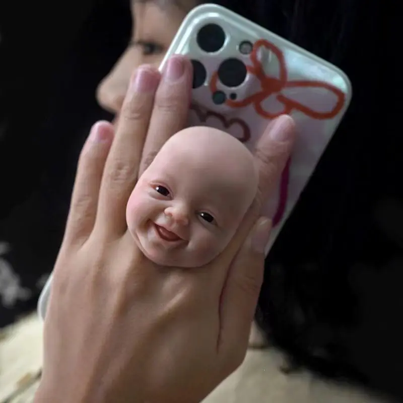 

"Smiley Face" with Mini Reborn Baby Doll Face Top ”Smile Everyday “For Phones HOT Anti-Stress Toy Gift For Newyear