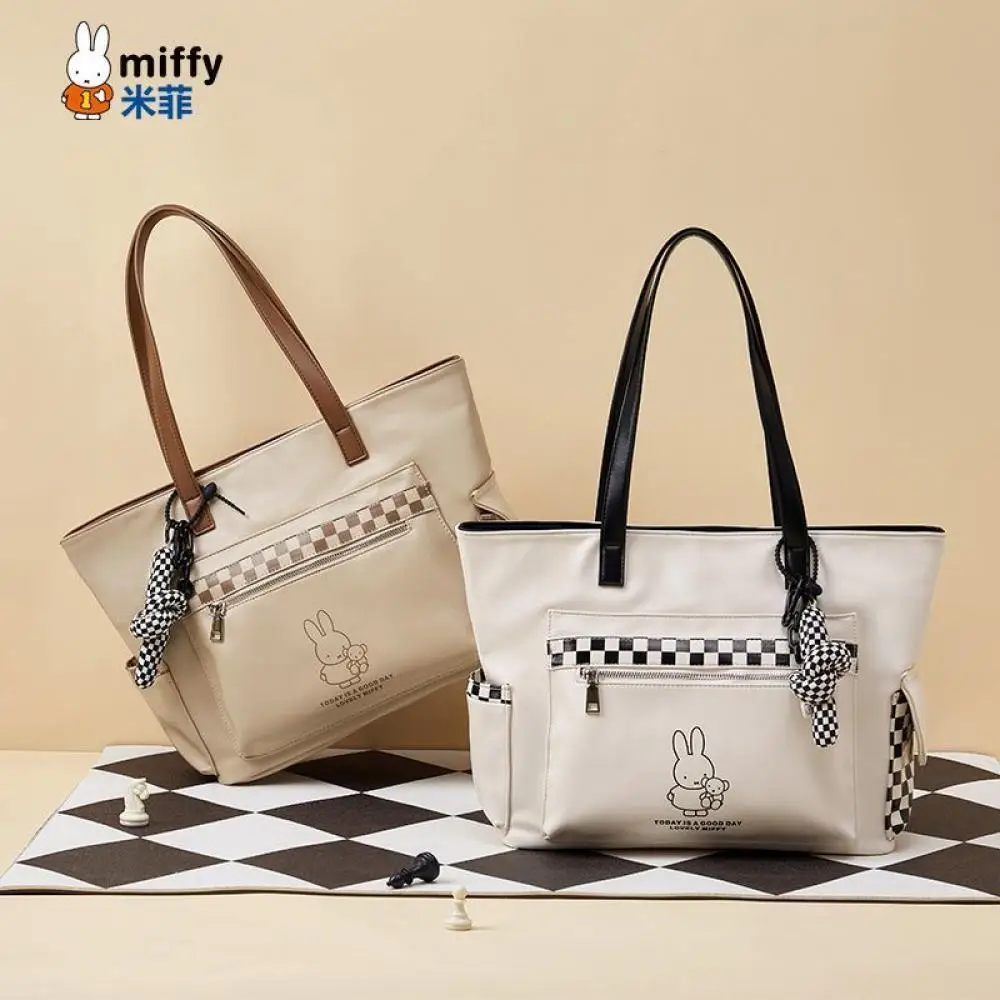 

Сумка-тоут Miffy New 2025 — это простая пригородная модная сумка на одно плечо большой вместимости с клетчатым узором.