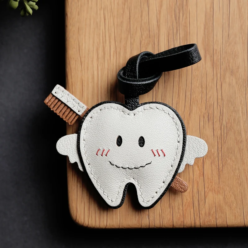 Leather handmade small tooth bag hanging ornament car key chain key chain doll luxury sense girl small decoration gifts