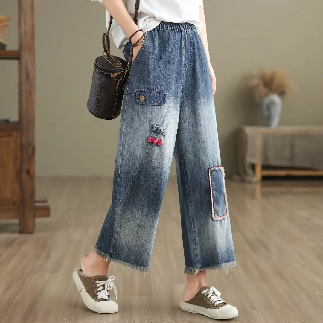 Aricaca damska wysoka talia naszywka z szerokimi nogawkami projektuje spodnie M-2XL modne spodnie dżinsowe z haftem