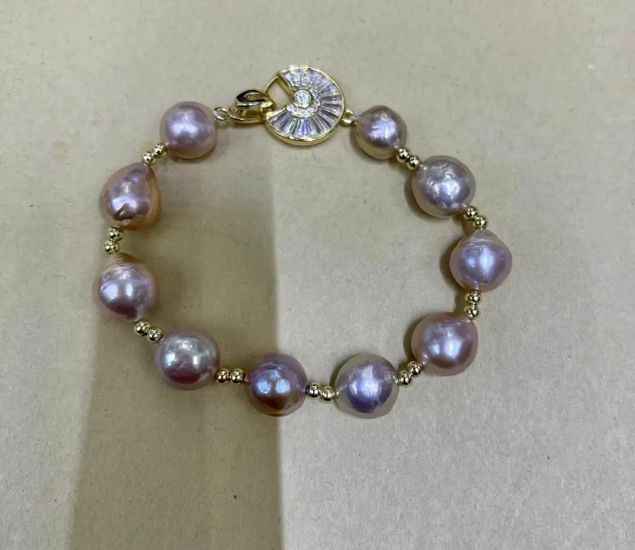 

Stunning 11-13mm South Sea Purple Baroque Pearl Bracelet 925s