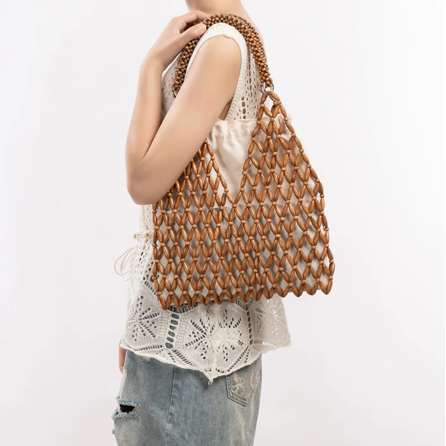 

Creative Double-layer Hollow-out Handbag Woven Bag Beach Bag For Seaside Vacations New Wooden Bead Women's Shoulder Bag