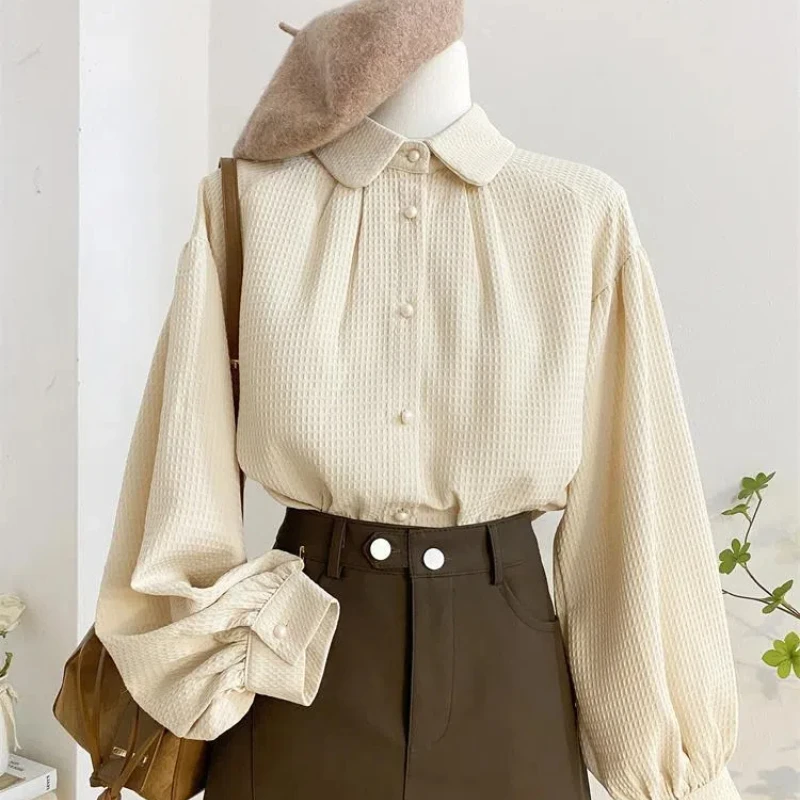 

French Retro Chic Doll Collar Long Sleeved Top Waffle Lantern Sleeve Shirt for Women with a Niche Design Loose
