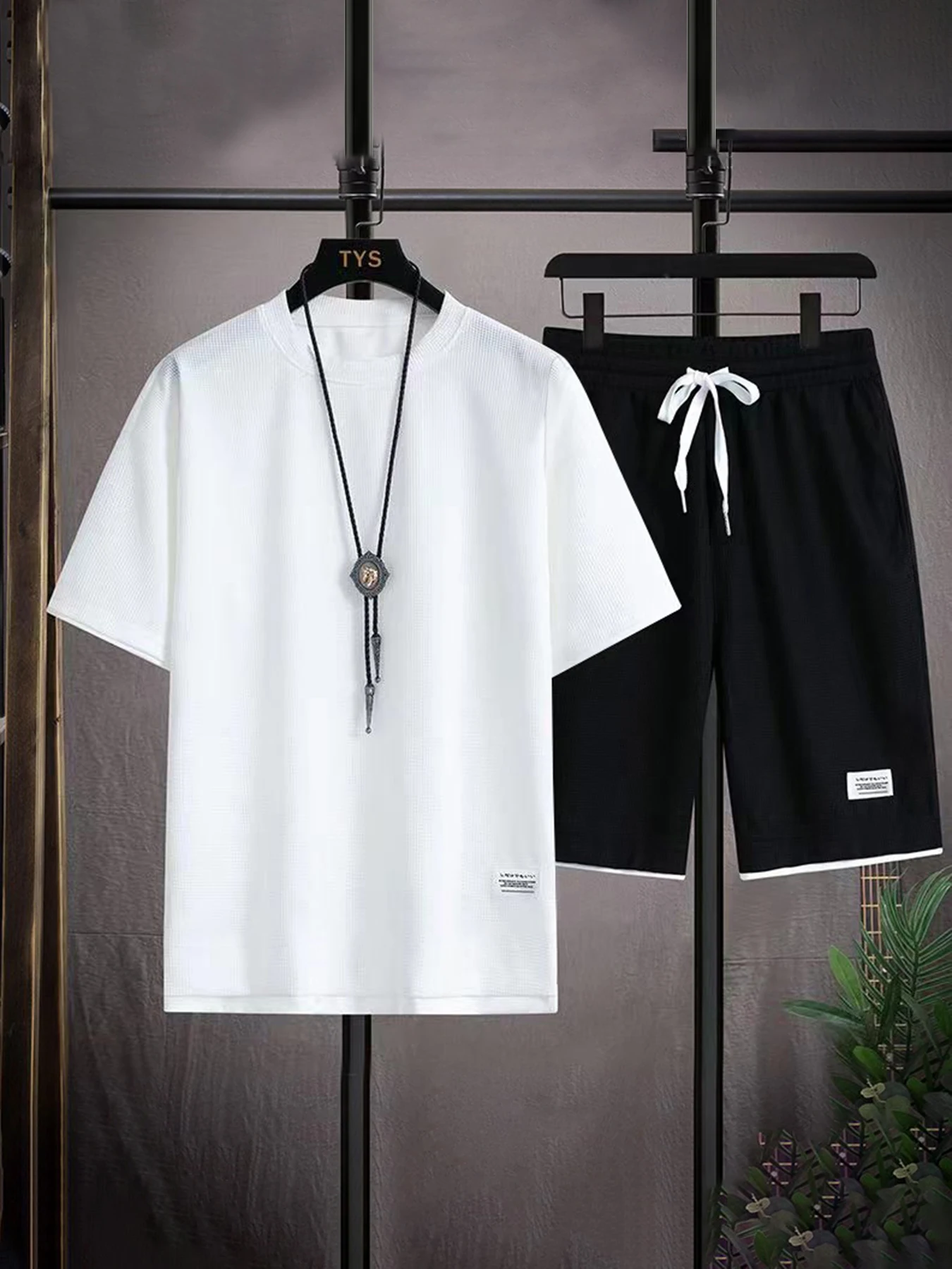 

2025 Elegant casual T-shirt and shorts set for men's sports suit loose and comfortable summer waffle set for men