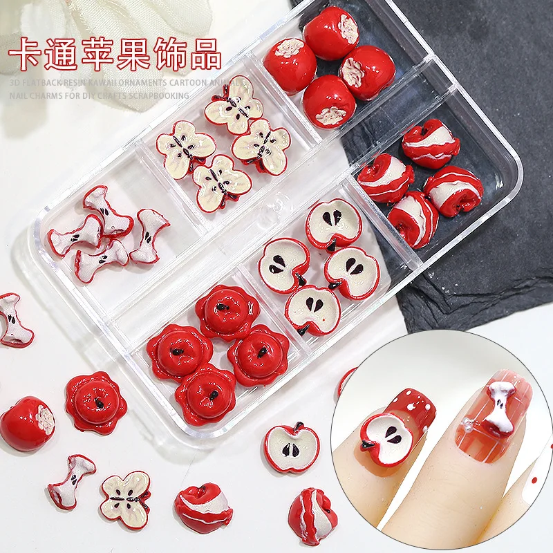 24個入り/箱 3D クリスマス レッド ラッキーアップル 漫画風 噛みつきフルーツスライス ネイルラインストーン デコレーション マニキュア キュートなシミュレーションチャーム