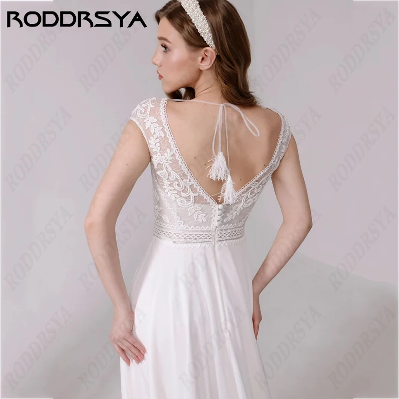 فساتين زفاف من RODDRSYA Boho رومانسية بياقة سكوب بدون ظهر من Vestidos Novia بأكمام بسيطة على شكل حرف a فساتين زفاف لحفلات العروس  رومانسية بياقة سكوب بدون ظهر من Vestidos Novia بأكمام بسيطة على شكل حرف a فساتين زفاف لح