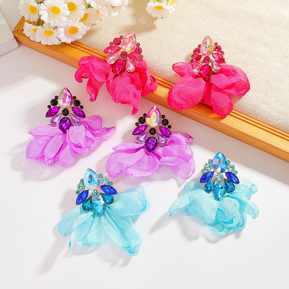 Cross-border personalized design diamond-encrusted flower solid color earrings simple and sweet style fashion commuter earrings