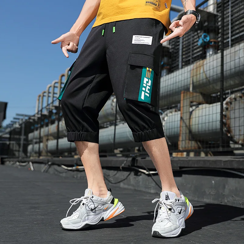 

Мужские летние повседневные брюки свободного кроя для работы, тонкие, быстросохнущие, спортивные, средней длины, прямые, с геометрическим принтом...