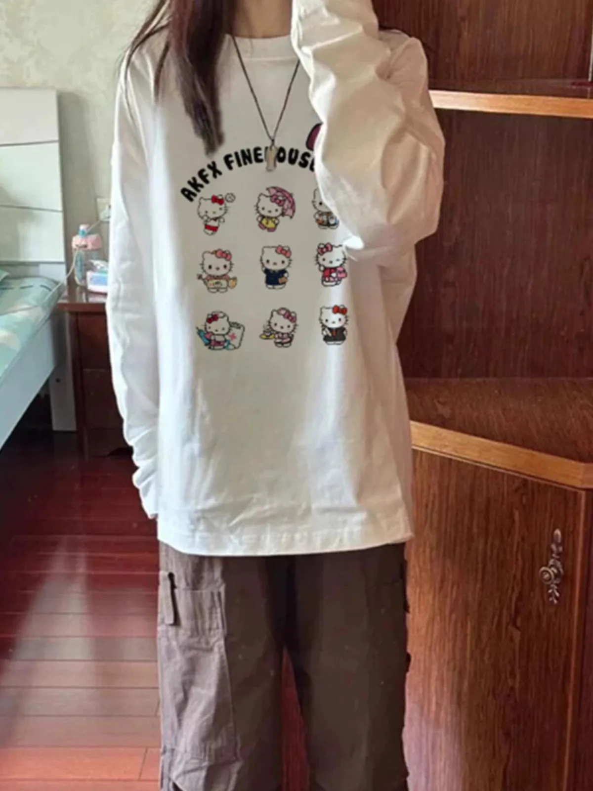 Süßes, langes Sve-T-Shirt aus reiner Baumwolle mit Kit-Print, vielseitiges, lockeres, schlankmachendes, lässiges, mittellanges Oberteil