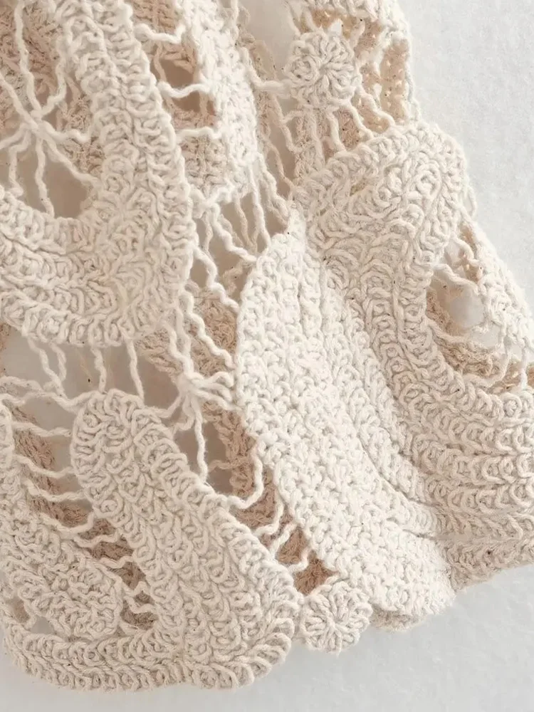 Maglione lavorato a maglia all'uncinetto semitrasparente corto moda donna Top chic da donna a maniche lunghe con scollo a O sexy