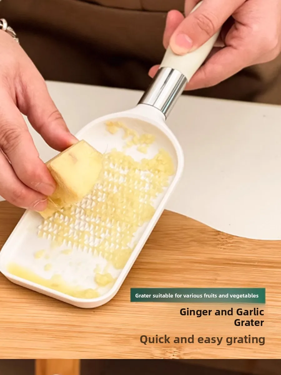 

Home Use Manual Garlic And Ginger inder with Handle Kitchen Tool for inding Garlic Paste Ginger Paste And Juicex32384-W