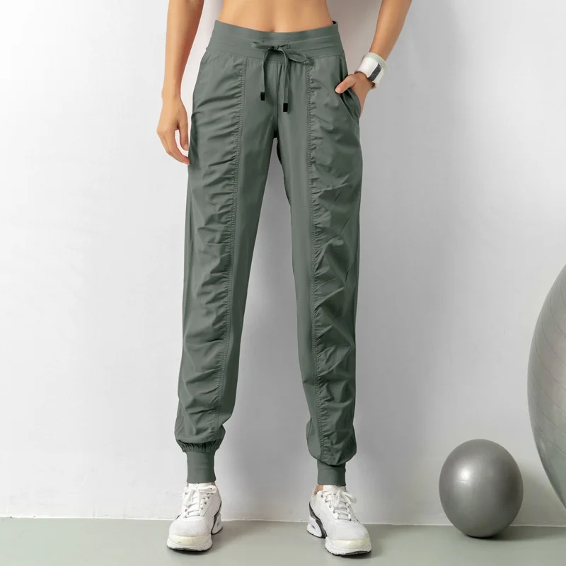 Yoga sports slacks with logo women pleated cuffed pants elastic drawstring waist sweatpants niners with pockets cargo trousers