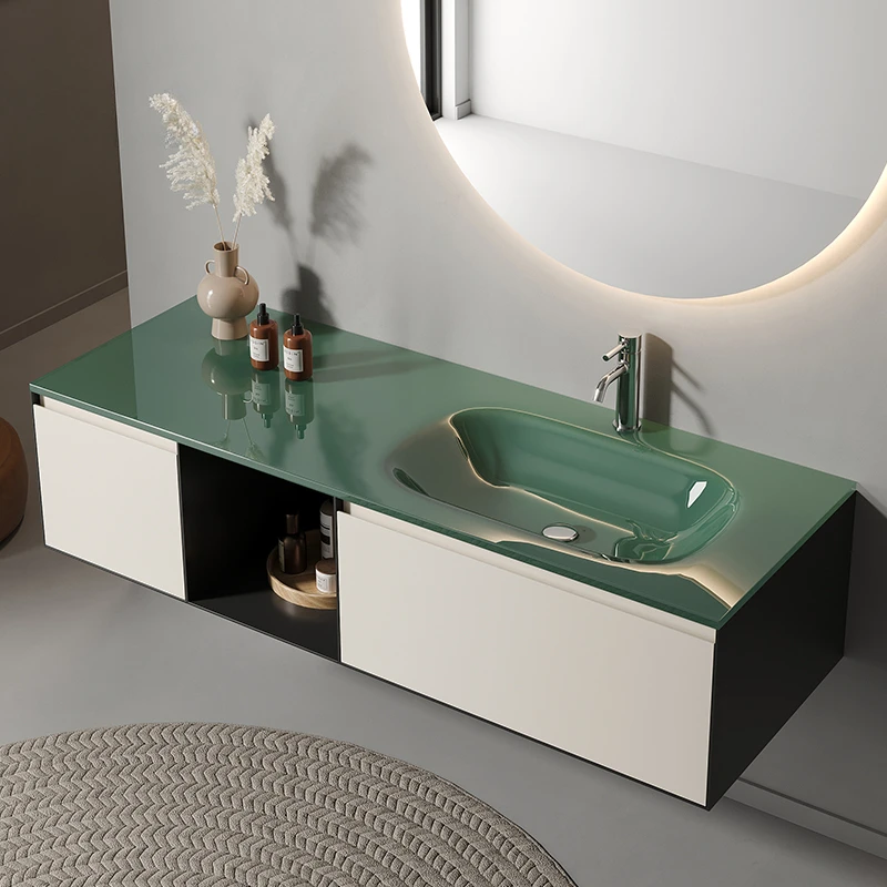 A minimalist glass wall mounted integrated basin with a green thin edge washbasin. The washbasin and washbasin are suspended