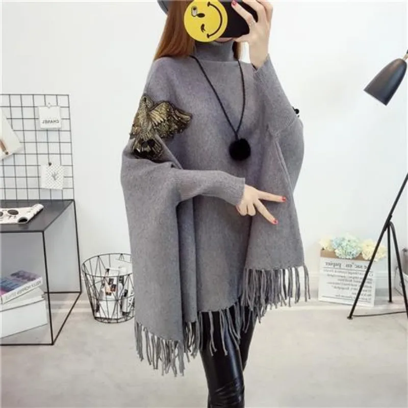 Autumn and winter new tassel cape shawl high neck pullover sweater women's mid to long cape loose bat sleeve jacket