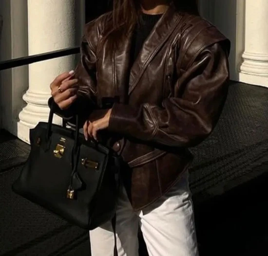 2025 Nova versátil jaqueta de imitação de couro retrô com alça e decote em V jaqueta de couro tendência de rua