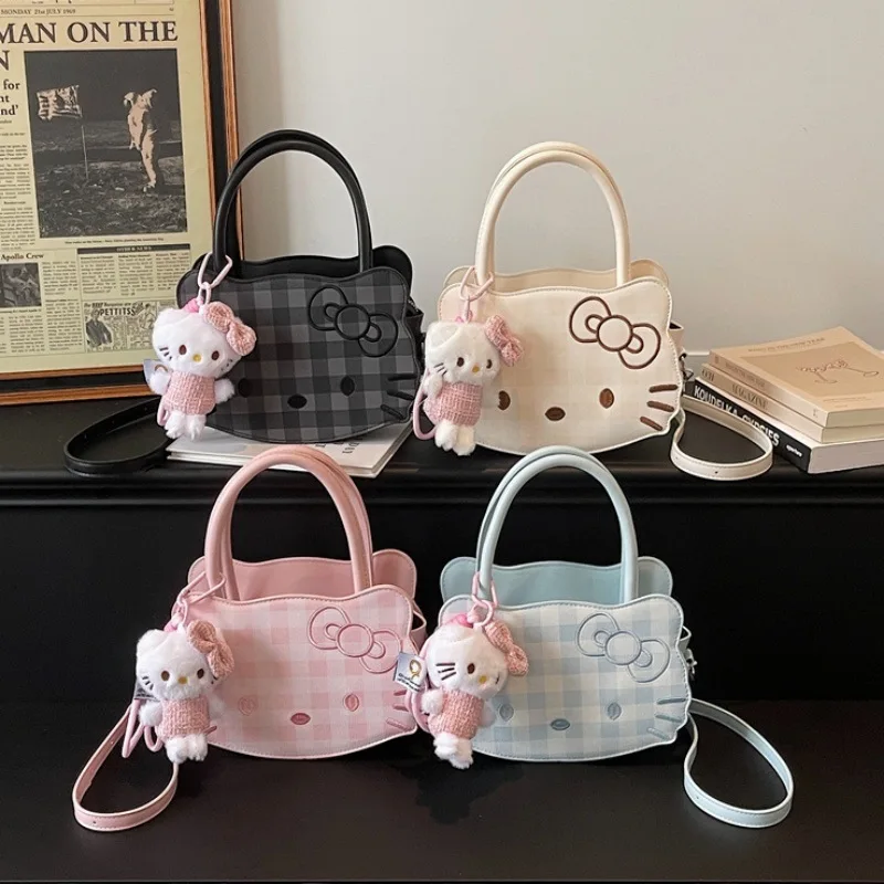 Korean version of niche design sweet Hello Kitty handbag 2026 new check cute KT cat face crossbody bag single shoulder