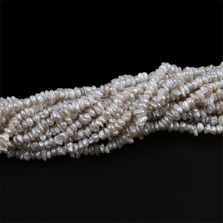 7-8mm White Keshi Shape Freshwater  Middle Drilled Pearl Strand