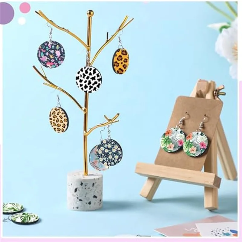 A59E-فراغات حلق التسامي مع خطافات القرط، حلقات القفز، سدادات الأذن، حامل بطاقات القرط وأكياس التعبئة والتغليف الشفافة