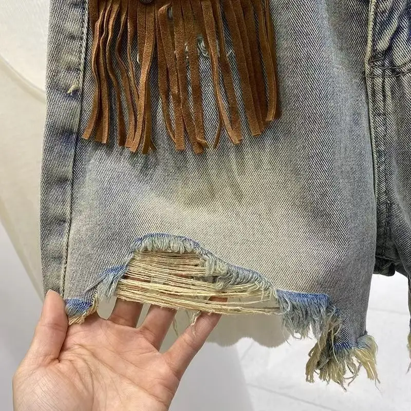 レトロタッセルリッピングリッピング女性デニムショーツインゴスファッションハイストリート夏ルーズワイドレッグパンツ A ラインショーツ