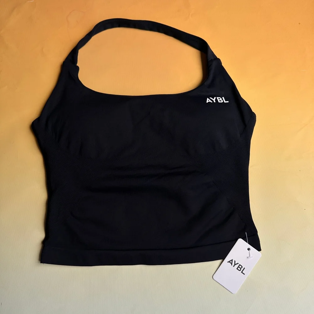 Marken-Sportbekleidung für Damen, Hautfreundliches Neckholder-Sporttop und Figurbetonte Hochtaillierte Shorts