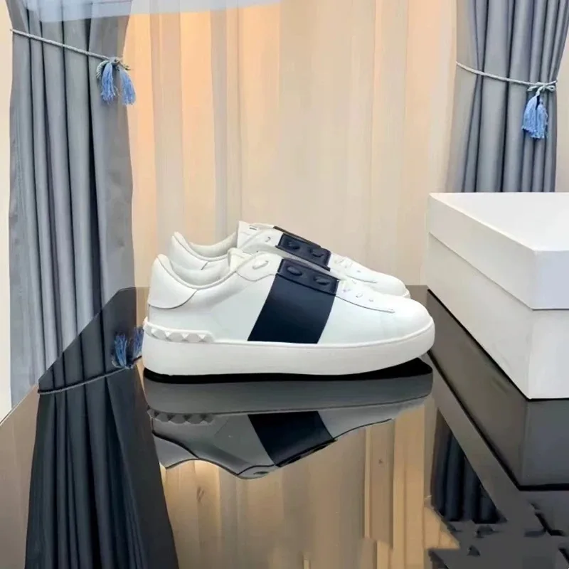 

Classic design ladies' white sneakers featuring stylish studs, comfortable flat sole, casual sports shoes Couple's sneaker