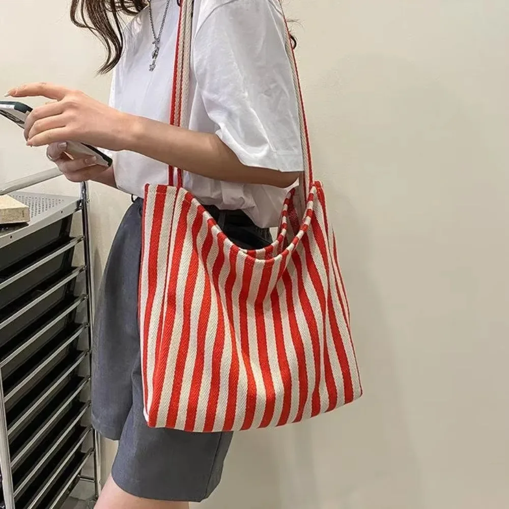 

Female Casual Multifunctional Travel Top-handle Handbag Large Capacity Canvas Women Shopper Tote Simple Striped Shoulder Bag2025