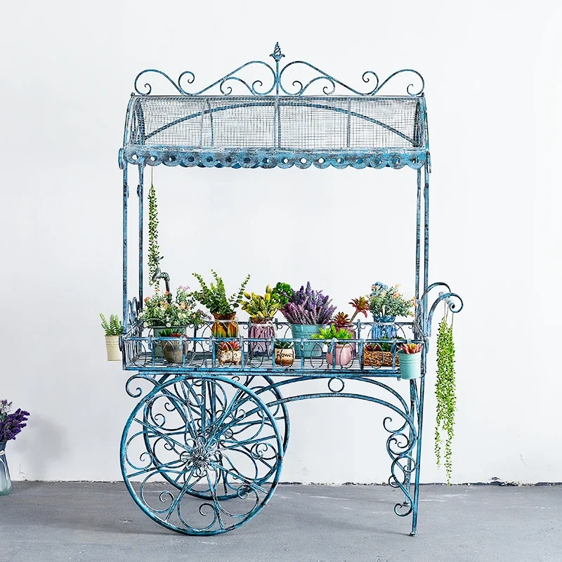 

American retro and old, wrought iron large float flower stand, shelf flower shop display rack garden garden decoration