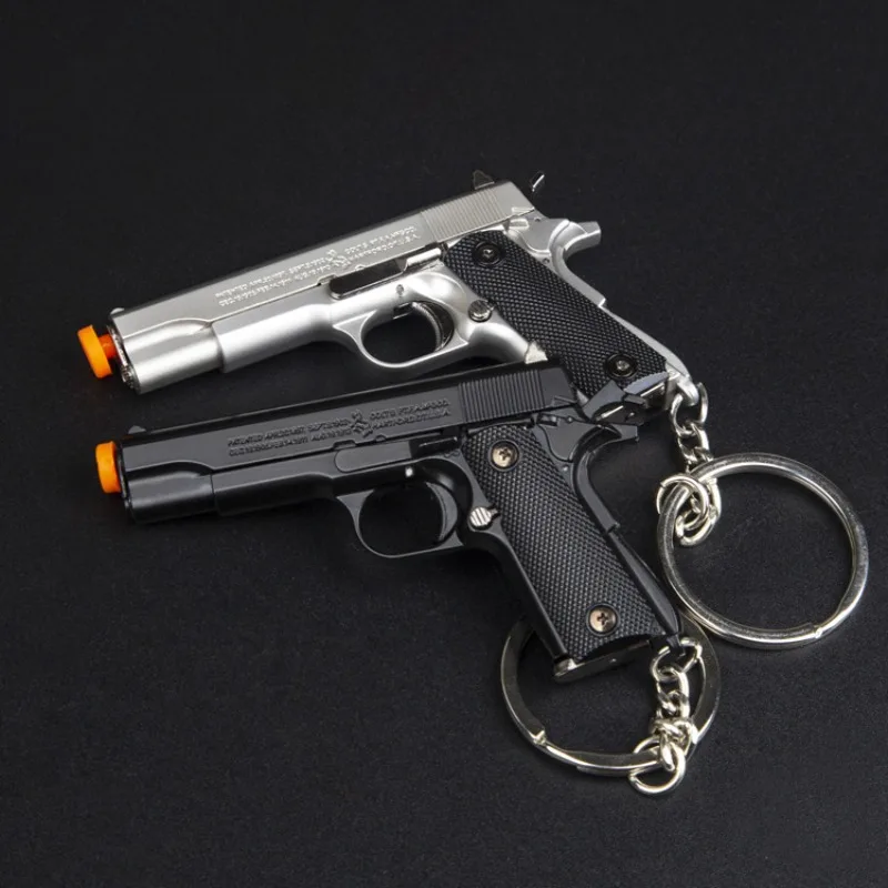 1:3 metallo oro M1911 Colt giocattolo modello di pistola Mini portachiavi Look collezione reale Pubg Prop compleanno appeso regalo di natale con custodia