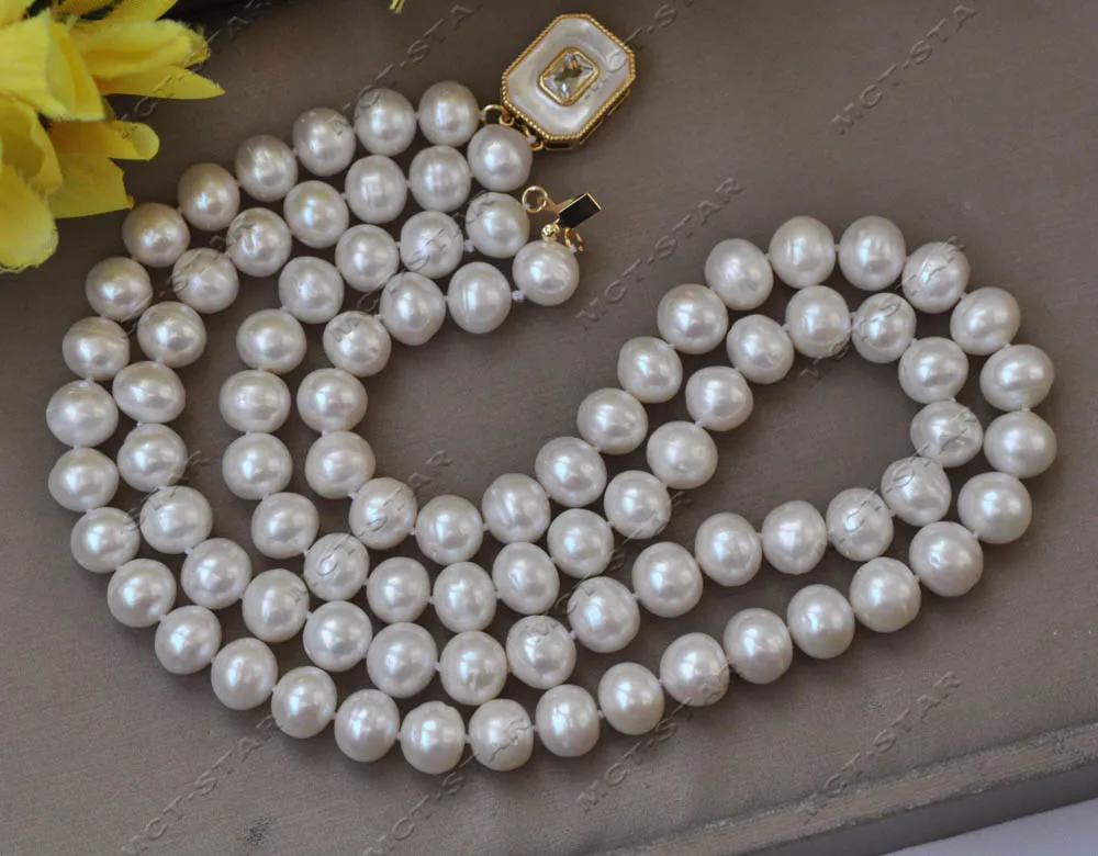 

MTC·STAR Z13073 2row 18'' 11mm White Round Freshwater Pearl Necklace Shell Clasp