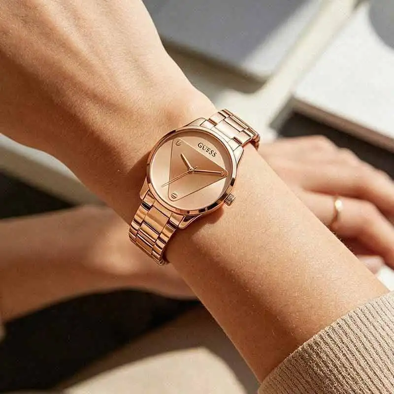 Guess Women Analog Quartz Watch,  Gold Stainless Steel Bracelet, Iconic Triangle Dial, Mineral Glass, 30M Daily Water GW0485L2