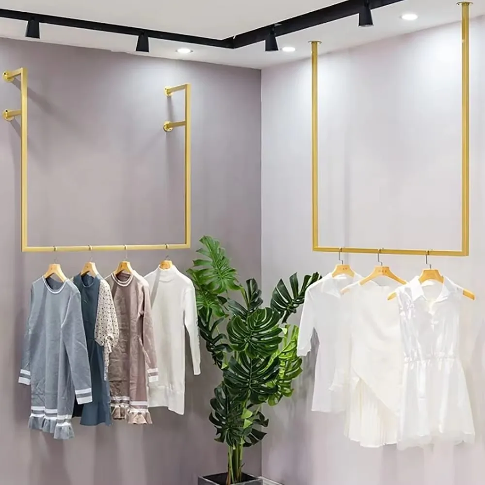 

Modern Style Golden Stainless Steel Wall Mounted Garment Clothing Rack for Boutique
