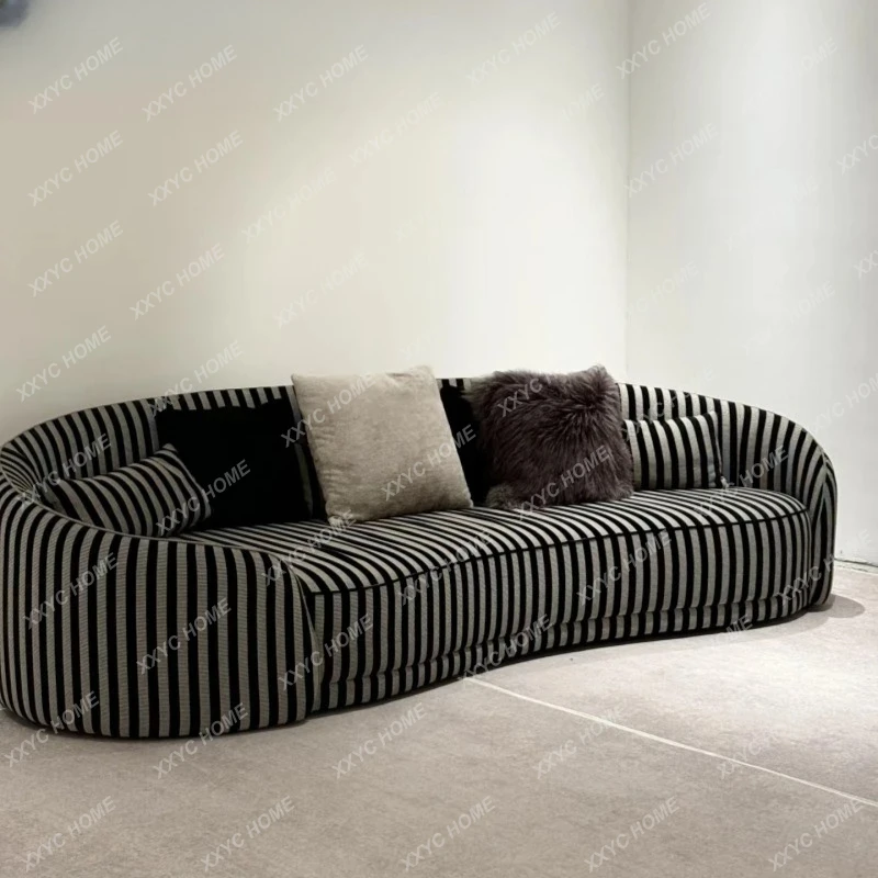 

L light luxury curved sofa black and white striped cloth multi-person special-shaped sofa