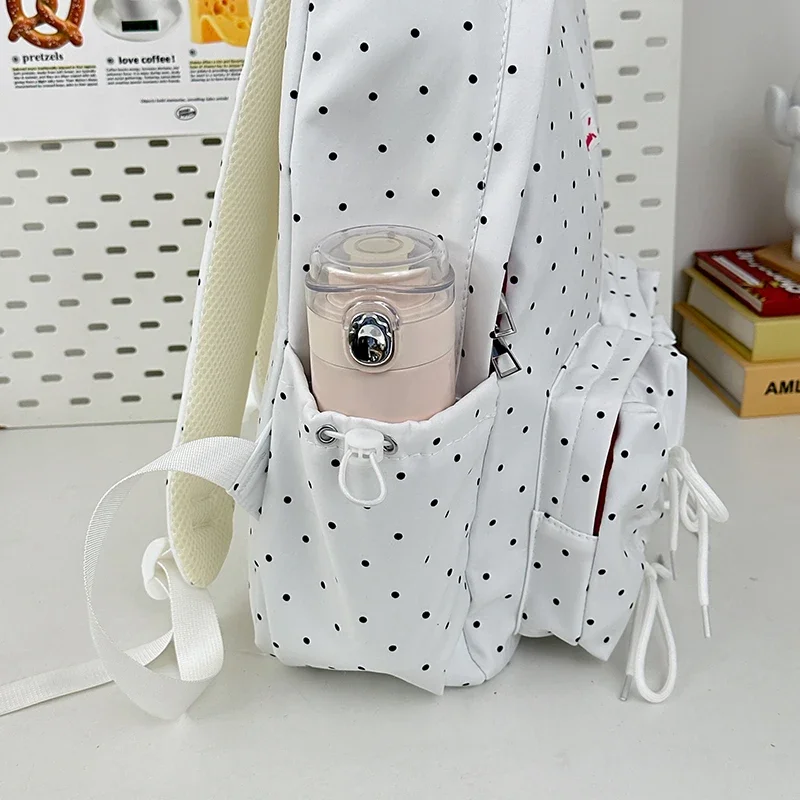 حقيبة ظهر الطالب مخططة من النايلون 2025 بساطة جديدة بلون سادة حقيبة ظهر عالية السعة للسفر خارج حقيبة ظهر متعددة الاستخدامات