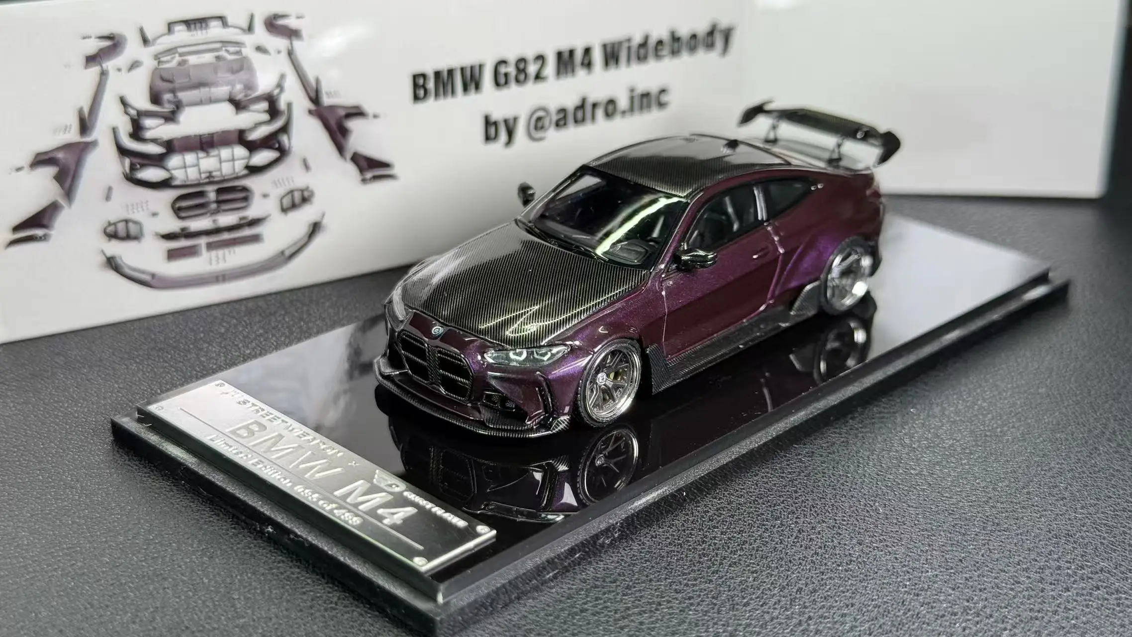 

SW 1:64 M4 G82 Exhibition Limited Edition Purple Carbon Roof Alloy Car Model