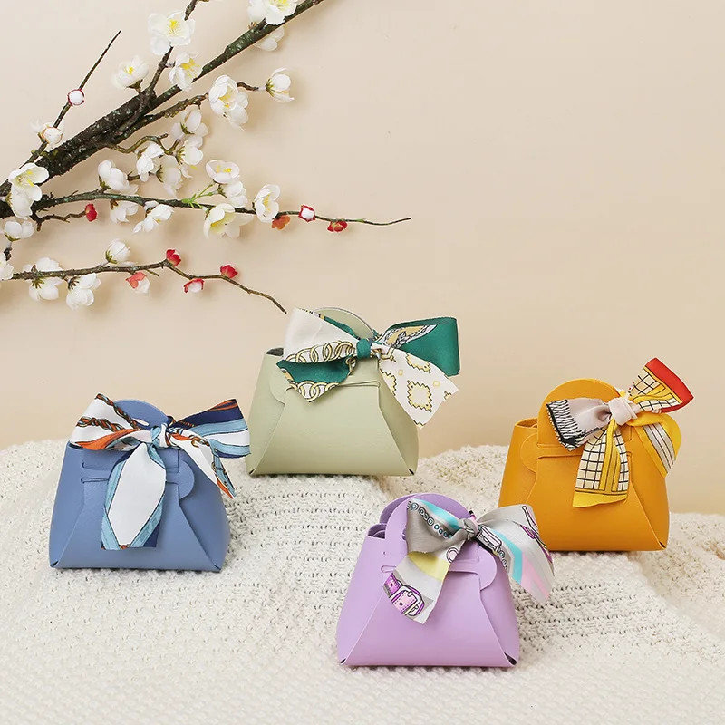 

60pcs Leather Gift Bags Bow Ribbon Packaging Bag Wedding Favour Distributions Bags Christmas Candy Packaging Box Mini Handbag