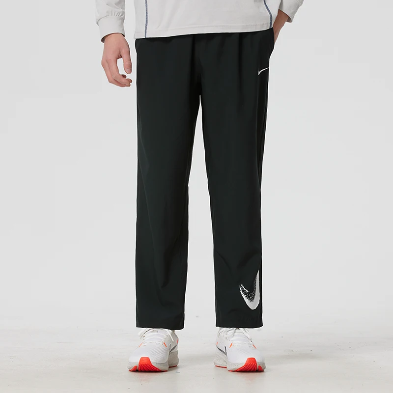 Pantalones largos tejidos para exteriores para hombre de Nike, pantalones holgados y transpirables de pierna recta, pantalones deportivos informales para correr If2202-010