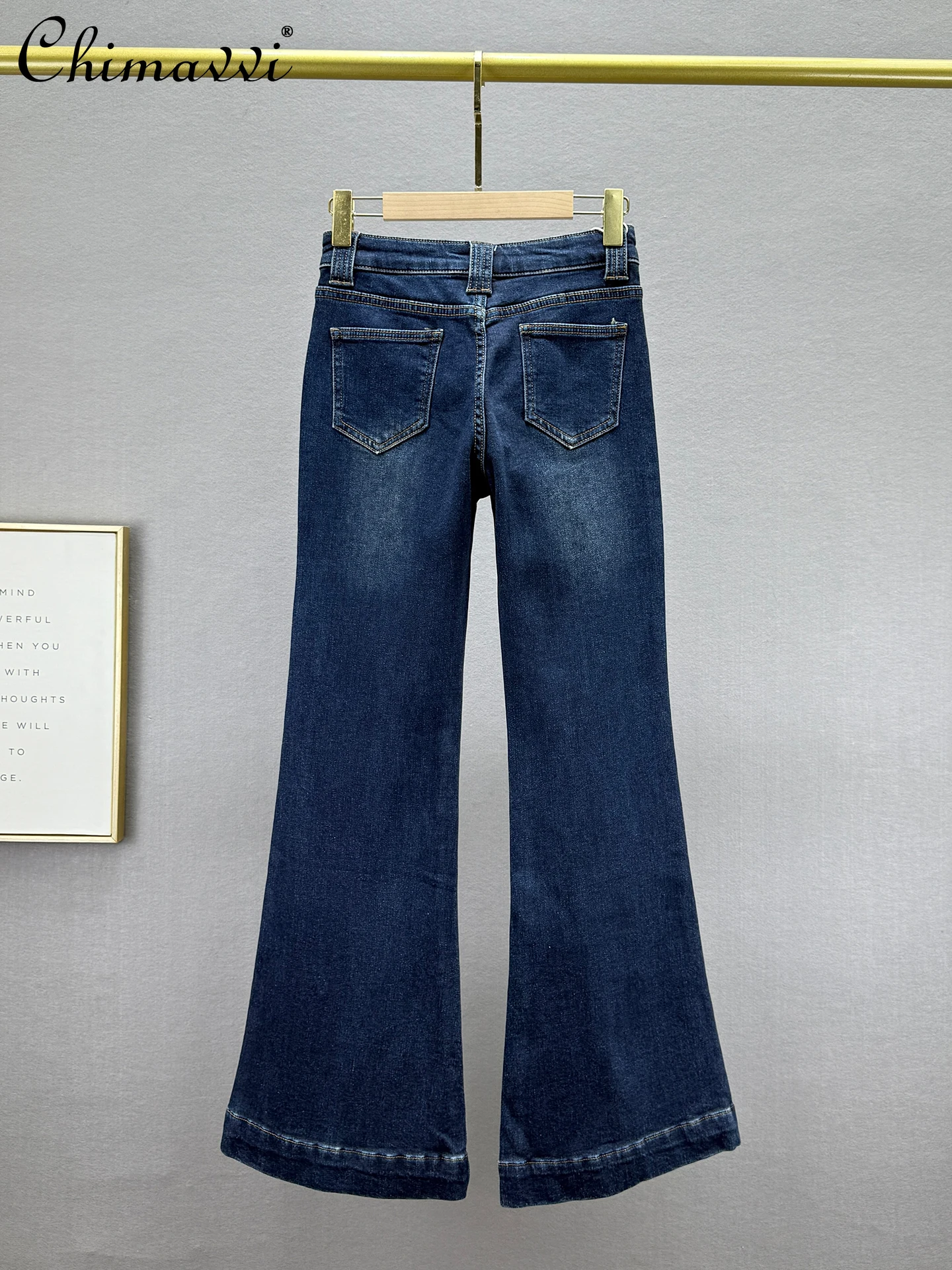 جينز عصري مبطن بالصوف للنساء شتاء 2025 جديد عالي الخصر بقصة ضيقة على الطراز الأوروبي سروال واسع مزين بحجر الراين