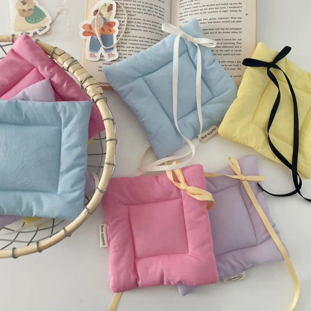 

Solid Color Multi-functional Coaster Thickened Fabric Sweet Drawstring Bow Ribbon Coaster Double-sided Portable Insulation Pad