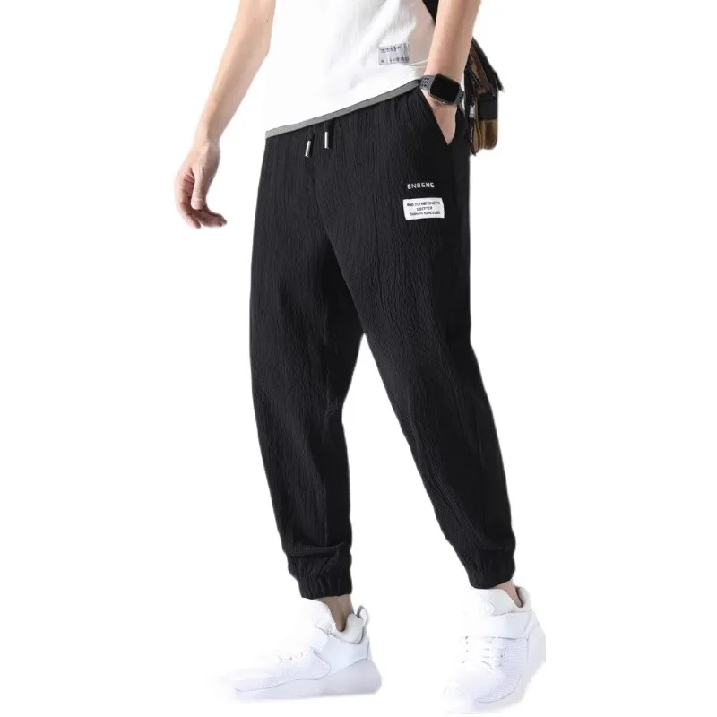 ผ้าไหมน้ําแข็งกีฬากางเกงลําลองผู้ชายฤดูใบไม้ผลิฤดูใบไม้ร่วงสํานักงานสวมใส่ผ้าลินินบางทนทานกางเกงขายาว Breathable น้ําหนักเบาฤดูร้อน