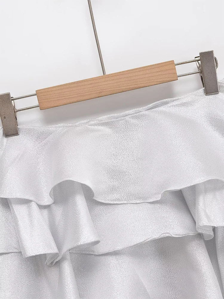Europese stijl nieuwe damesmode veelzijdig temperament eenvoudige asymmetrische gelaagde decoratieve minirok