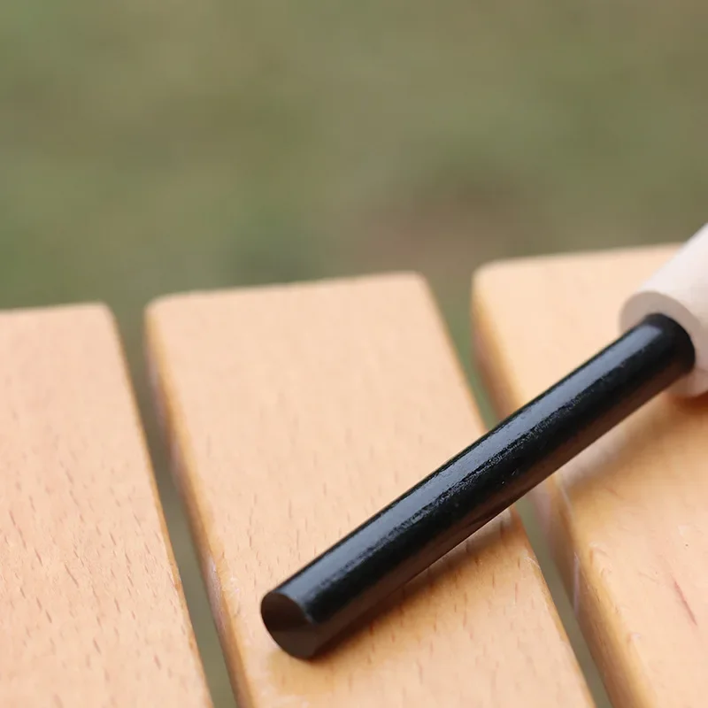 Portable outdoor flint, equipped with outdoor survival tools such as magnesium sticks, firearms, wooden handles, and flint stick